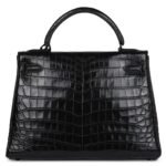 PRE-OWNED HERMÈS KELLY RETOURNE 32 SO BLACK MATTE NILOTICUS CROCODILE BLACK HARDWARE