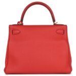 PRE-OWNED HERMÈS KELLY RETOURNE 28 ROUGE PIVOINE TOGO GOLD HARDWARE
