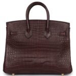 PRE-OWNED HERMÈS BIRKIN 25 ROUGE SELLIER MATTE POROSUS CROCODILE GOLD HARDWARE