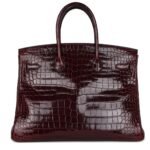PRE-OWNED HERMÈS BIRKIN 35 BORDEAUX SHINY POROSUS CROCODILE PALLADIUM HARDWARE