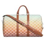CELINE MEDIUM TRAVEL BAG IN TRIOMPHE CANVAS SUNSET AND CALFSKIN