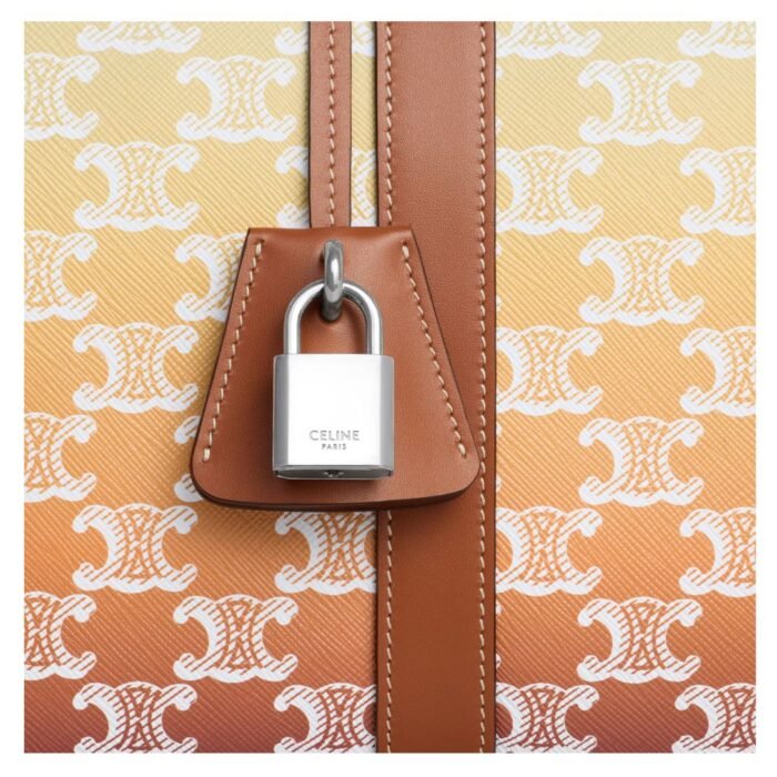 CELINE MEDIUM TRAVEL BAG IN TRIOMPHE CANVAS SUNSET AND CALFSKIN
